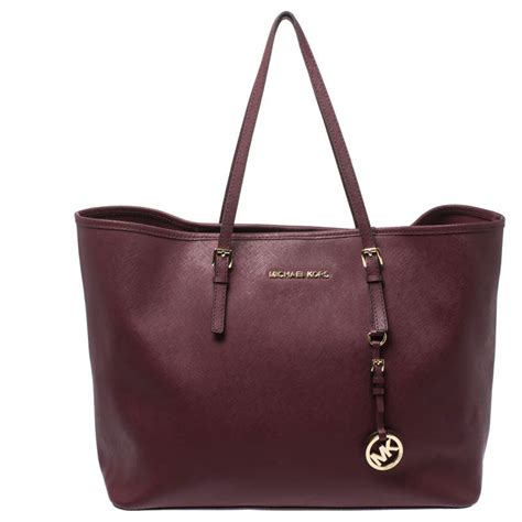 Michael kors burgundy jet set handbag + FREE SHIPPING